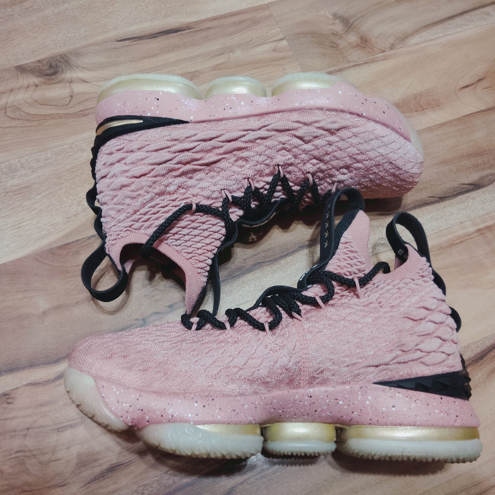 Nike Pink Athletic Shoes with Textured Design and Thick Sole